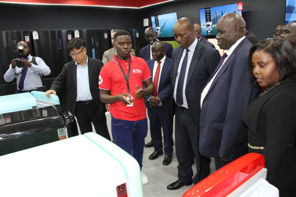 K-elec CEO Nam Kyo Jung,K-elec , brand team leadersales Kevin Kiprop , Cabinet Secretary for Investments, Trade and Industry,Lee Kinyanjui ,K-elec co founder David Langat ,Dr. Helen Langat, at the K-elec exhibition after the grand launch of K-elec at Syokimau